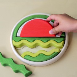 Tanti pezzi per creare un'anguria con il puzzle della BumbuToys