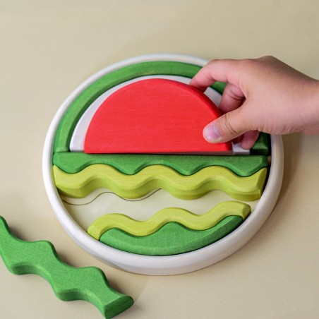 Tanti pezzi per creare un'anguria con il puzzle della BumbuToys