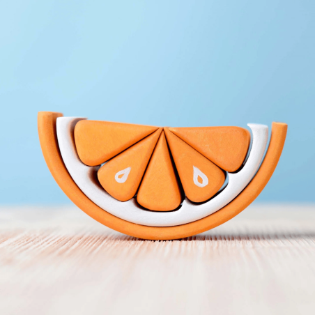 Colori accesi per questo puzzle in legno a forma di Mandarino della BumbuToys