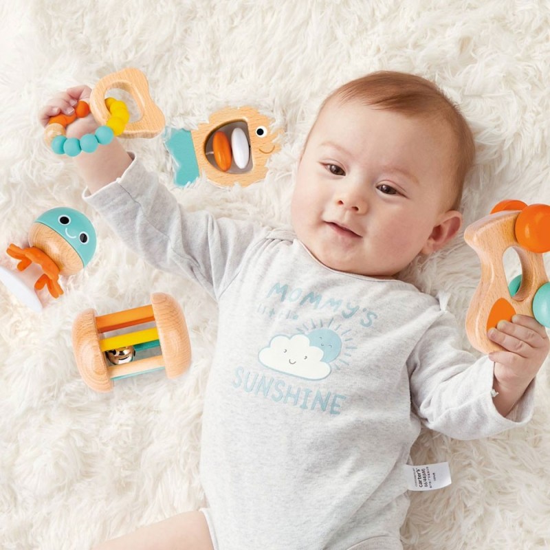 Un set di 5 articoli in legno della Hape per lo sviluppo sensoriale del bambino Un set di 5 articoli in legno della Hape per lo sviluppo sensoriale del bambino