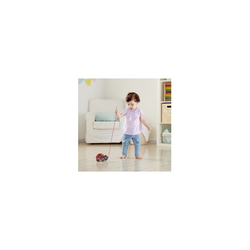 La Coccinella trainabile di Hape aiuta il bambino a mantenere l'equilibrio in piedi mentre gioca La Coccinella trainabile di Hape aiuta il bambino a mantenere l'equilibrio in piedi mentre gioca